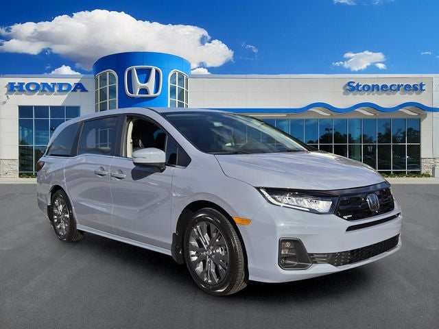 2026 Honda Odyssey Touring in Sonic Gray Pearl — front three-quarter view