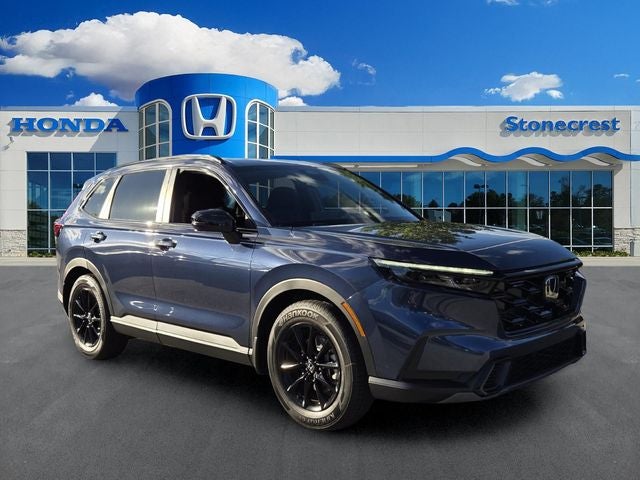 2026 Honda CR-V Hybrid Sport in B-640M/Canyon Rive — front three-quarter view