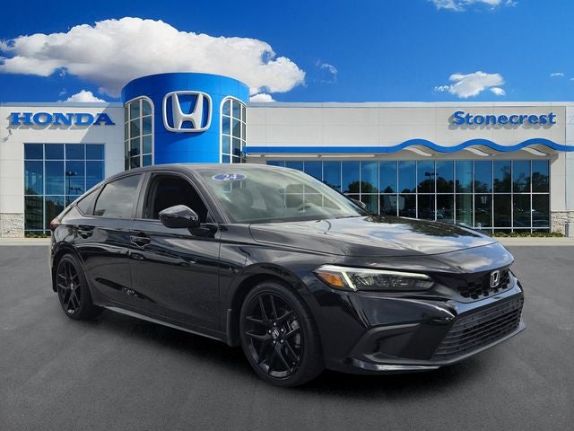 2024 Honda Civic Sport in Crystal Black Pearl — front three-quarter view