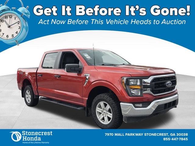 2023 Ford F-150 XLT in Hot Pepper Red Metallic Tinted Clearcoat — front three-quarter view