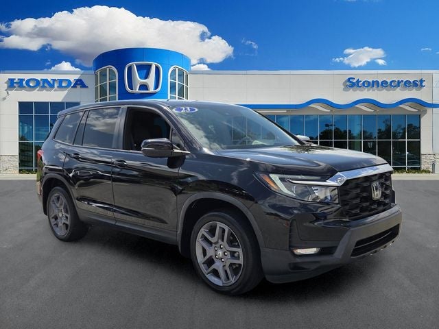 2023 Honda Passport EX-L in Crystal Black Pearl — front three-quarter view