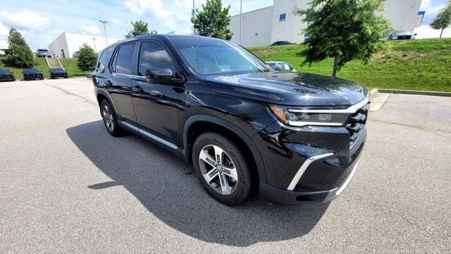 2025 Honda Pilot EX-L in Crystal Black Pearl — front three-quarter view