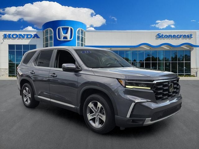 2023 Honda Pilot EX-L 7 Passenger in Modern Steel — front three-quarter view
